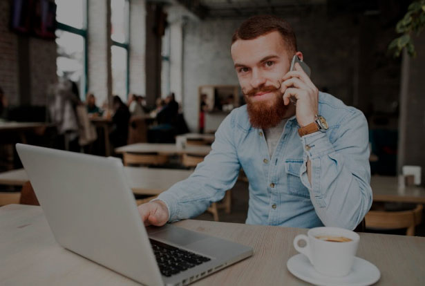 A financial outsourcing services executives attend to a call.