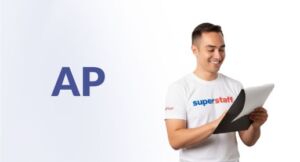 An outsourced accounting services professional is holding a to-do checklist.