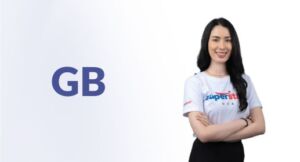 Heading (6) An outsourced bookkeeping executive woman is smiling while looking at the camera.