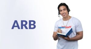 An outsource bookkeeping professional man is holding a book records.