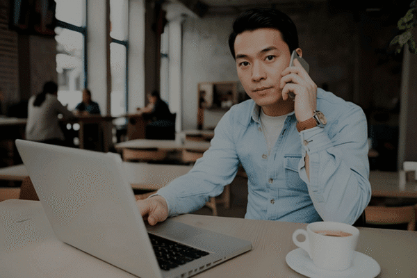 home 4 A full-time financial outsourcings services professional cups her chin while looking on.